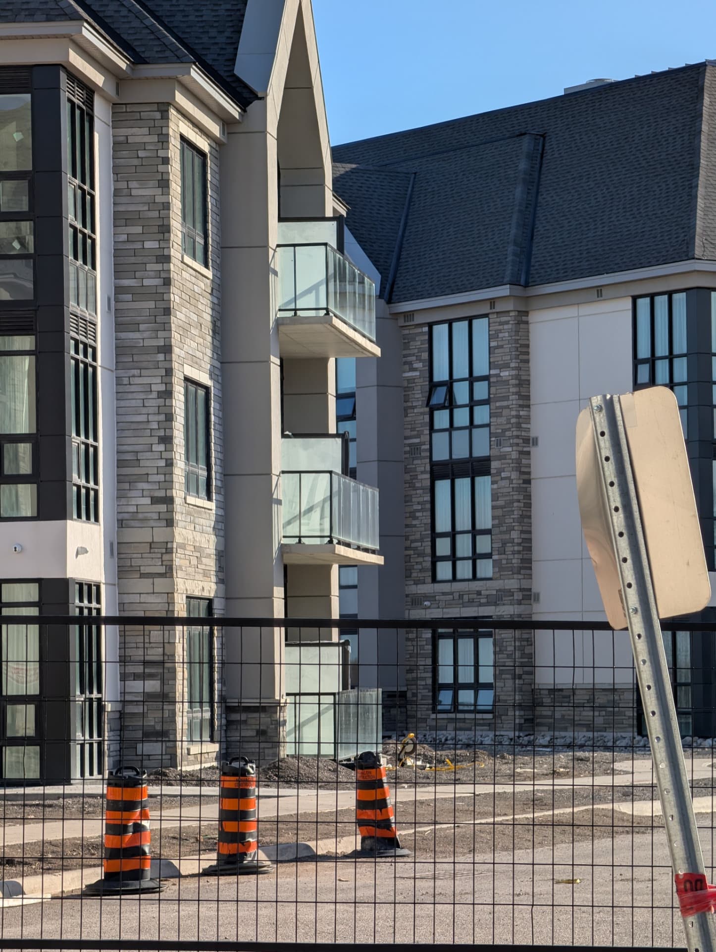 Glass balcony railings on a new residential building